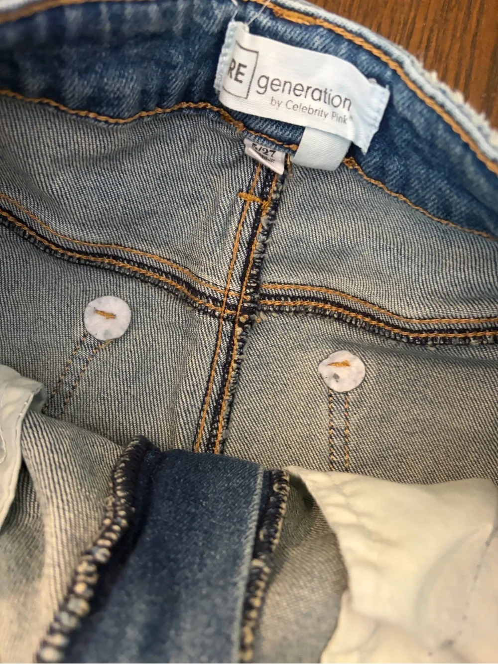 High-Rise Frayed Light Wash Denim Shorts